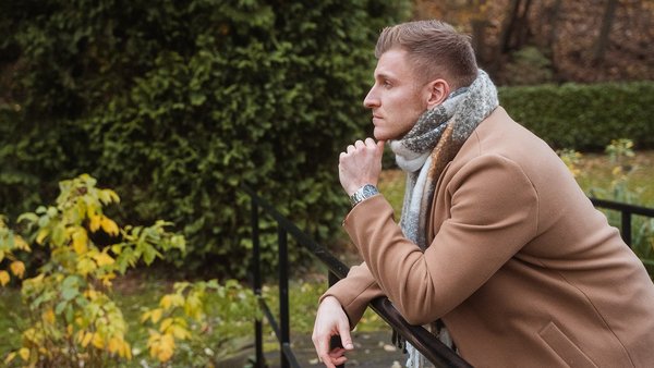 Too many choices: Navigating career indecision in a world of possibilities A man looks into the distance, deep in thought