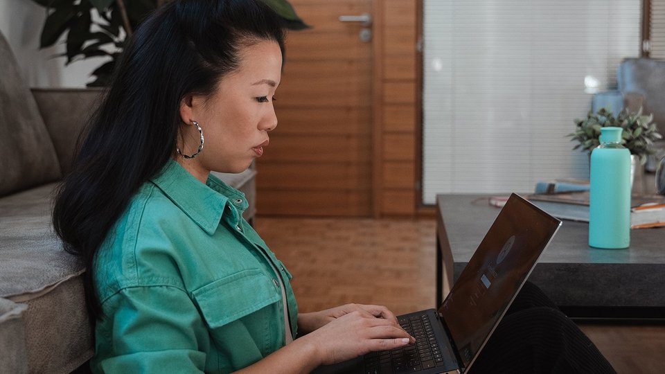 Mind your biorhythm Woman working concentrated on her laptop