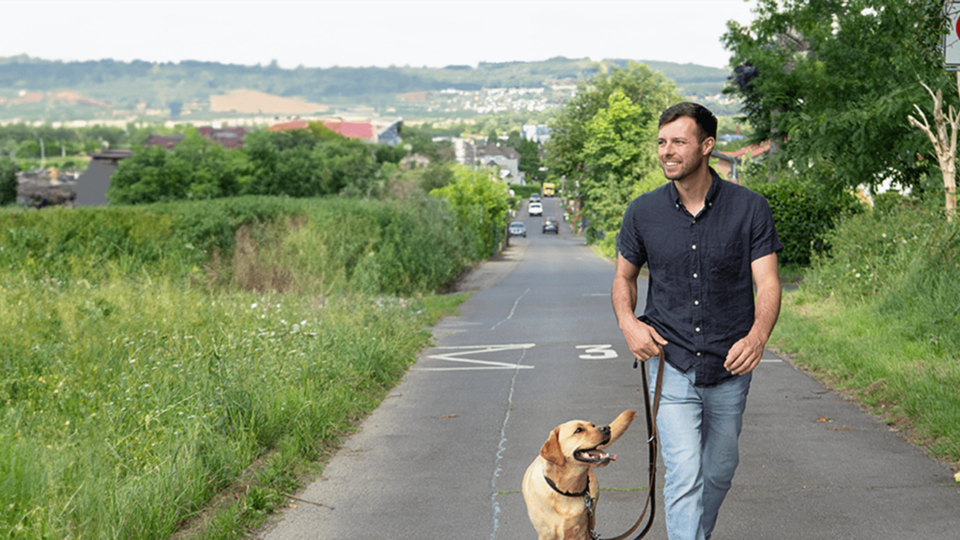 Bennett from OVB walks the dog during his lunch routine