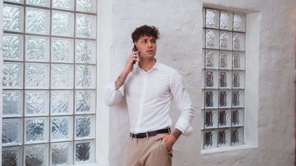 Business Man on a call with his cell phone.